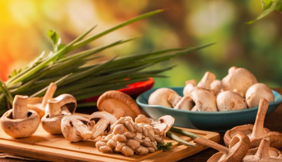 Benefits-of-mushroom-supplements-for-stress-Various-mushroom-supplements-on-a-wooden-table.