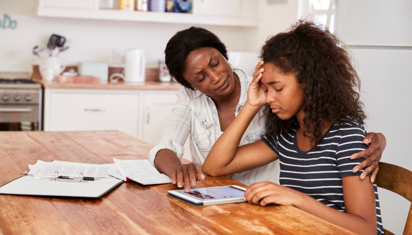 Is anxiety a symptom of stress? A lady -standing-in-a-room-looking-stressed-and-anxious